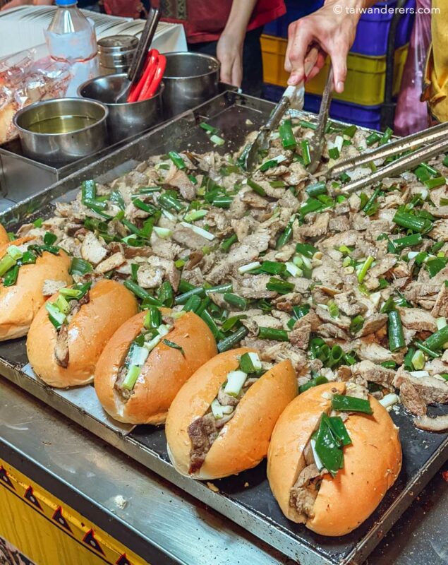 Buns with pan fried braised pork and leek at Keelung Night Market Taiwan