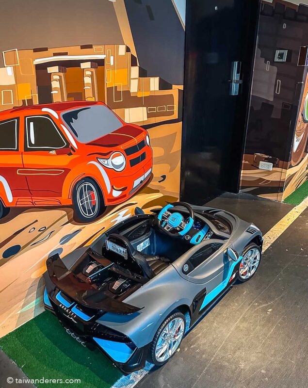 Silks Place Yilan hotel. Racing corridor for kids toy electric cars