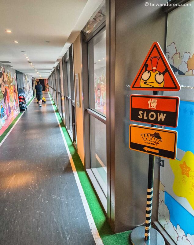 Silks Place Yilan hotel. Racing corridor for kids toy electric cars